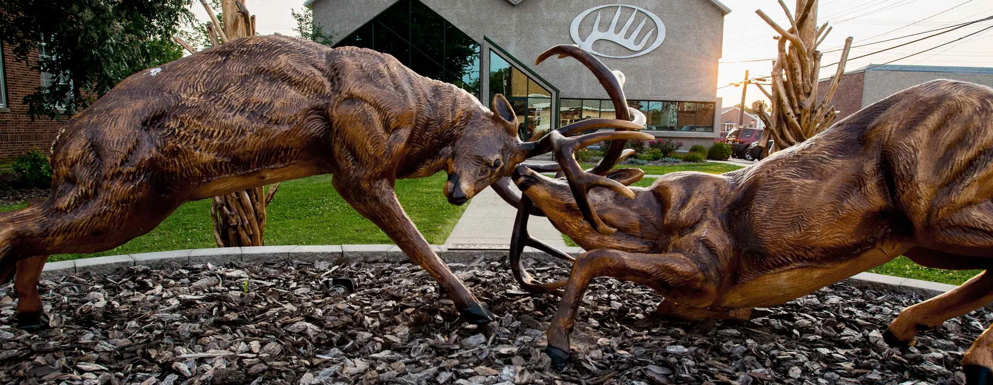 two bucks fighting statue